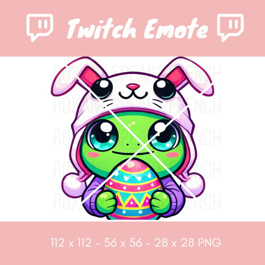 Cute Easter frog Twitch emote featuring a green frog in a lilac bunny hat, holding a colorful Easter egg, ideal for holiday streams