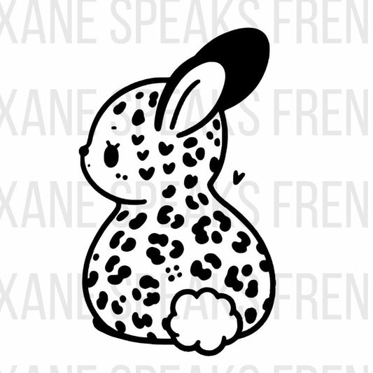 Black and white illustration of a bunny with a leopard print pattern, sitting and looking to the side. The image is available in SVG and PNG formats